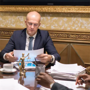 Lawyer’s office with case preparation materials, representing the legal process involved in pursuing Lemon Law claims in California."